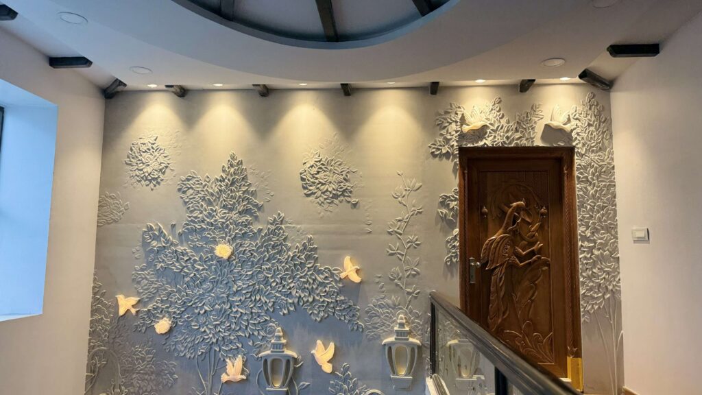 Custom wall feature detail for Bhimavaram residential interior by IWY Designs