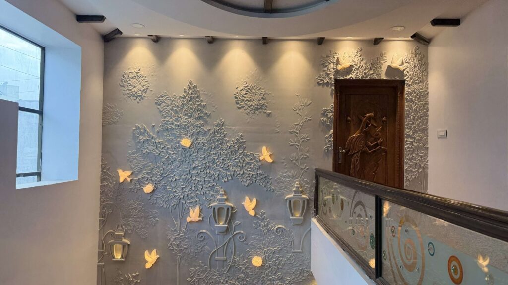 Custom wall feature detail for Bhimavaram residential interior by IWY Designs