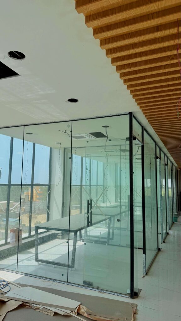 Lab glass cabin and corridor with wood ceiling by IWY Designs Hyderabad